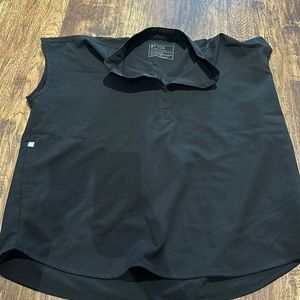 FIGS Rafaela™ Oversized
Scrub Top size L never worn.